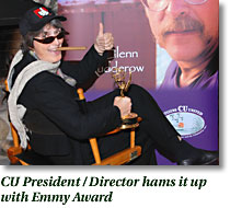 CU President/Director hams it up with Emmy Award