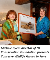 Michele Byers, director of NJ Conservation Foundation, presents Conserve Wildlife Award to Jane