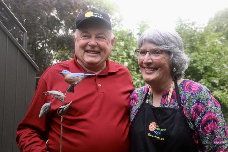 Allen Jackson and Jane Morton Galetto with Art Parkin's carving of a bluebird